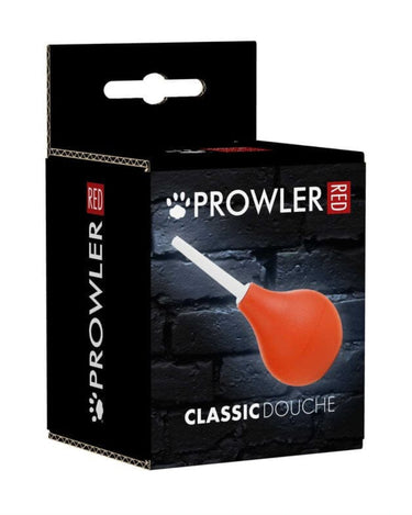 a box with a red pickle in it